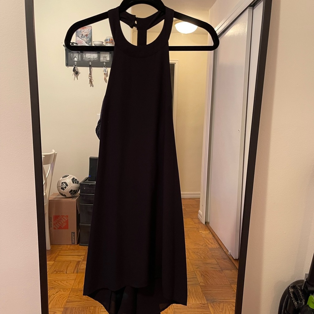 Black, at the knee dress with exposed back!